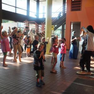 children dancing in the Pillsbury House Theatre lobby